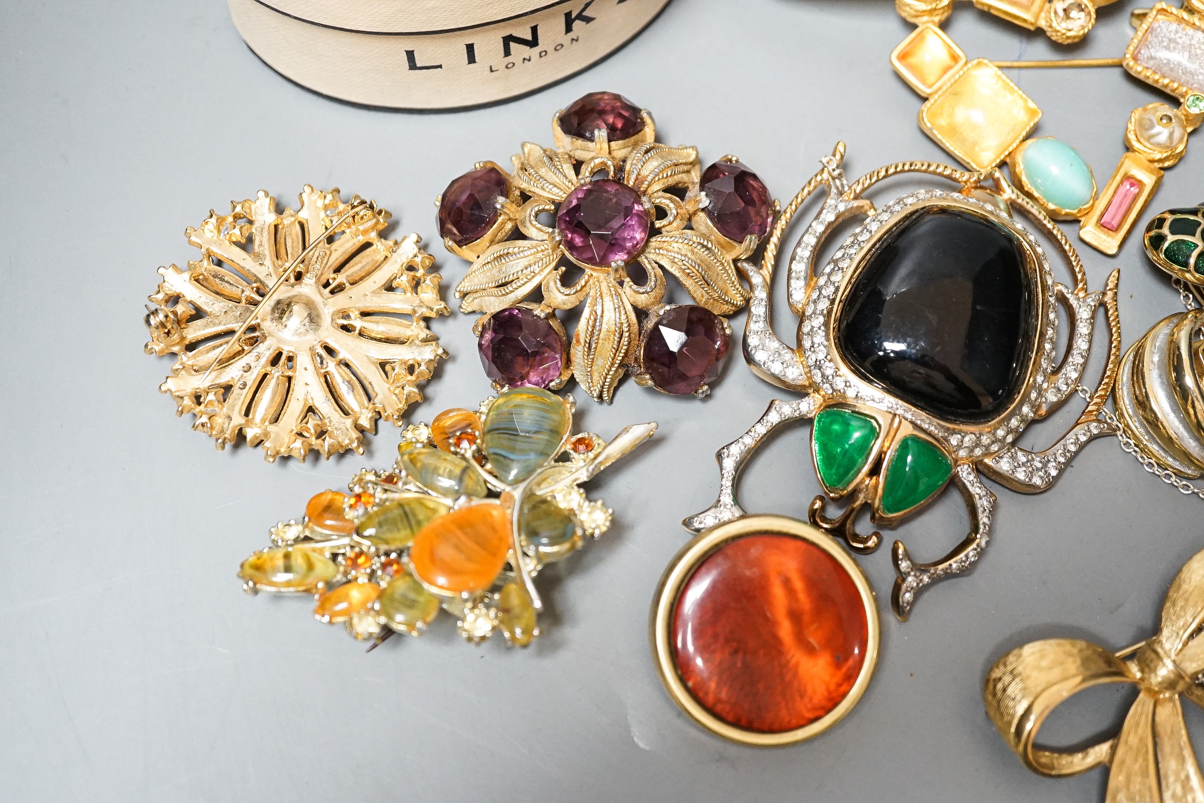 A mixed lot of costume jewellery including Christian Lacroix, scarab brooch stamped Valentino, Dior glasses etc.